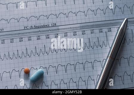 Desk of a doctor. Elements that a cardiologist uses in his work. Patient study material. Stock Photo