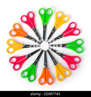 multicolored scissors, children, sewing, tailoring theme, arranged in a circle, isolated on white background Stock Photo