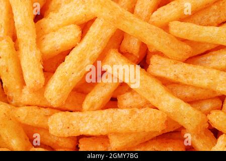 Top view of spicy cheese puff sticks background Stock Photo