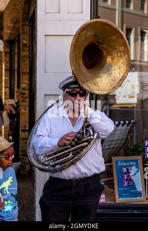 A Busker Playing Music, Greenwich, London, UK. Stock Photo