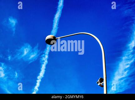 Street light in a streaky blue sky Stock Photo