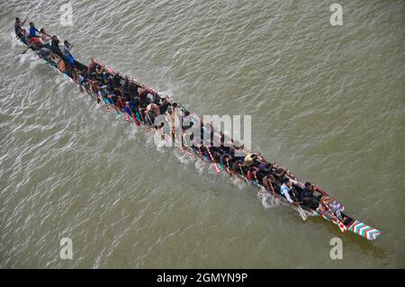 The traditional Bangladeshi Boat race contest on the Chenger Khal river in the Badaghat area of Sadar upazila, Sylhet, Bangladesh. Stock Photo