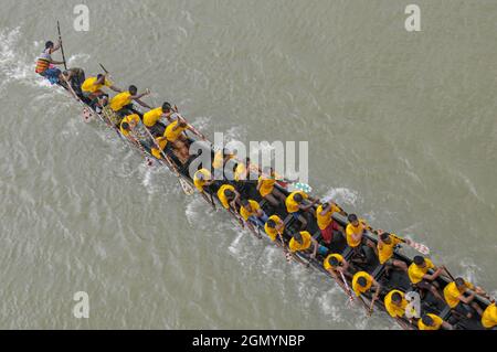 The traditional Bangladeshi Boat race contest on the Chenger Khal river in the Badaghat area of Sadar upazila, Sylhet, Bangladesh. Stock Photo