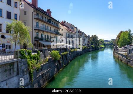 09.08.2021: Ljubljana, Slovenia: Ljubljanica river with river bank in Ljubljana Slovenia Stock Photo