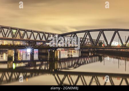 scenic night shot of railway bridge at night Stock Photo