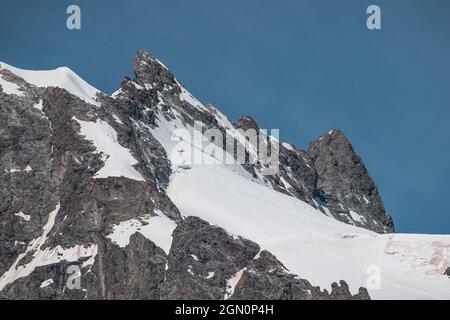 Aerial view of La Meije mountain covered with snow in Alps, France Stock Photo