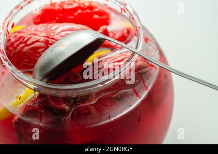 Punch prepared for Halloween party with decorative elements stylized as human organs, scary drink Stock Photo