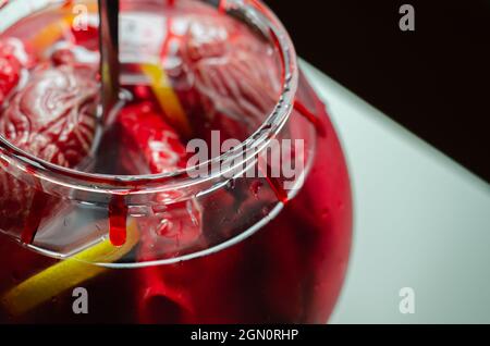 Punch prepared for Halloween party with decorative elements stylized as human organs, scary drink Stock Photo