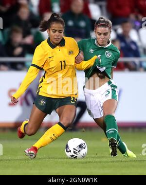 Australia's Mary Fowler (left) and Republic of Ireland's Jamie Finn battle for the ball during the women's international friendly match at the Tallaght Stadium in Dublin, Ireland. Picture date: Tuesday September 21, 2021. Stock Photo