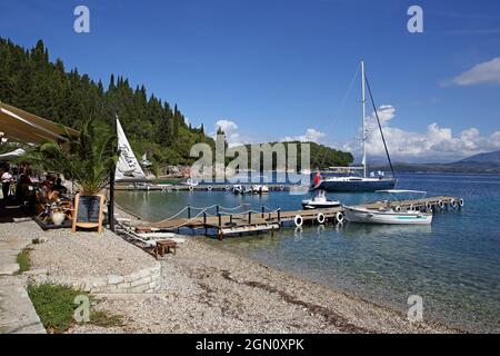 Taverna Toula located in the small Agni Bay on the northeast coast of the island of Corfu is a popular restaurant, Ionian Islands, Greece Stock Photo