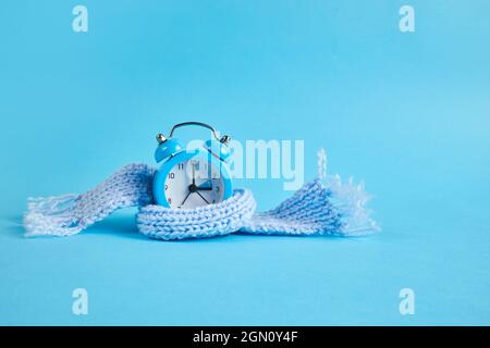 Clock changing from summer to winter time. Stock Photo