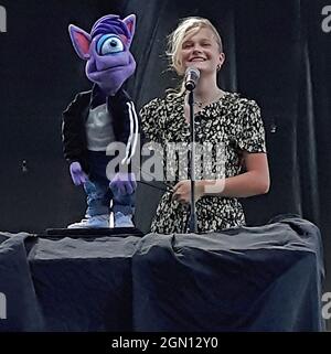 Ventriloquist Darci Lynne Farmer winner of NBCÕs AGT 2017 season performs on stage at the Kansas State Fair with her puppet Ivan Stock Photo