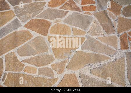 Orange old stone road surface. Seamless Texture. The texture of a stone road. High quality photo Stock Photo