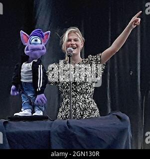 Ventriloquist Darci Lynne Farmer winner of NBCÕs AGT 2017 season performs on stage at the Kansas State Fair with her puppet Ivan Stock Photo