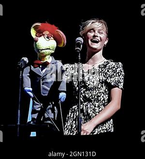 Ventriloquist Darci Lynne Farmer winner of NBCÕs AGT 2017 season performs on stage at the Kansas State Fair with her mouse puppet Oscar Stock Photo