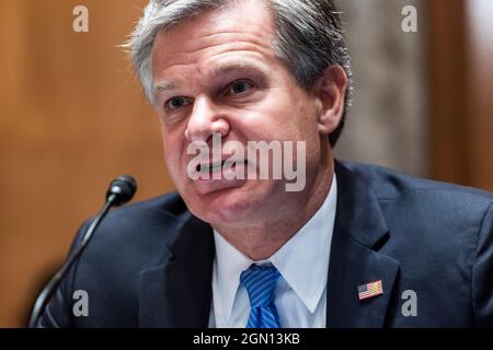 Washington, DC, USA. 21st Sep, 2021. FBI Director Christopher Wray testifies before a Senate Homeland Security and Governmental Affairs hearing on terror threats to the US in the Dirksen Senate Office Building in Washington, DC, USA, 21 September 2021. Credit: Jim LoScalzo/Pool via CNP/dpa/Alamy Live News Stock Photo