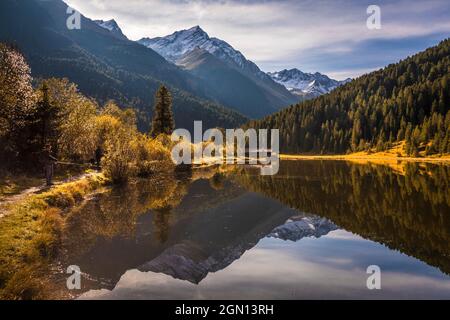 Small mountain lake in Lüsenstal, St. Sigmund im Sellrain, Stubai Alps, Tyrol, Austria Stock Photo