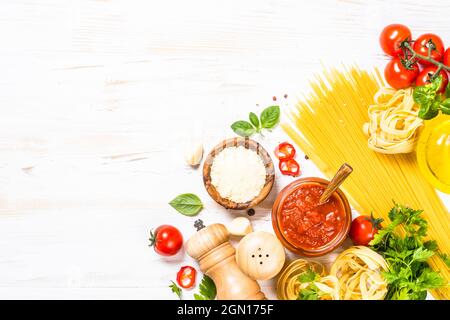 Italian food background at white bkitchen table. Stock Photo