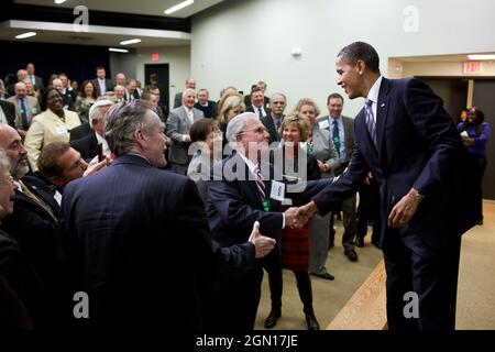 President Barack Obama greets audience members after delivering remarks at the annual U.S. Department of Agriculture Regional Appointee meeting in the Eisenhower Executive Office Building South Court Auditorium, Feb. 21, 2012. (Official White House Photo by Pete Souza) This official White House photograph is being made available only for publication by news organizations and/or for personal use printing by the subject(s) of the photograph. The photograph may not be manipulated in any way and may not be used in commercial or political materials, advertisements, emails, products, promotions that Stock Photo