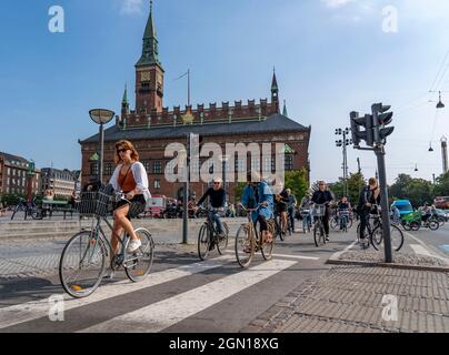 Cyclists on cycle paths, Radhuspladsen, City Hall Square, in downtown Copenhagen, is considered the cycling capital of the world, 45% of residents tra Stock Photo