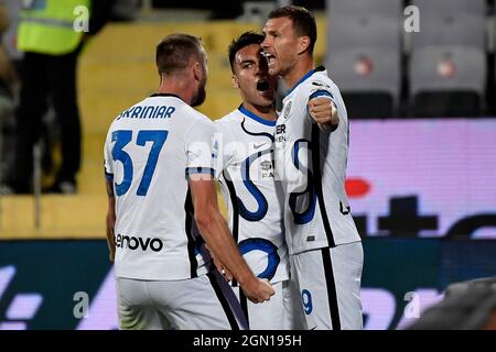 Firenze, Italy. 21st Sep, 2021. Edin Dzeko of FC Internazionale celebrates with Milan Skriniar and Lautaro Martinez after scoring the goal of 1-2 during the Serie A 2021/2022 football match between ACF Fiorentina and FC Internazionale at Artemio Franchi stadium in Florence (Italy), September 21st, 2021. Photo Andrea Staccioli/Insidefoto Credit: insidefoto srl/Alamy Live News Stock Photo