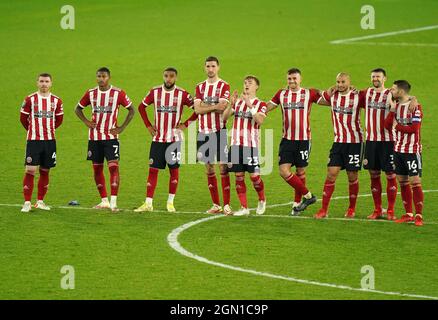 Sheffield United players react after defeat in a penalty shoot-out during the Carabao Cup third round match at Bramall Lane, Sheffield. Picture date: Tuesday September 21, 2021. Stock Photo