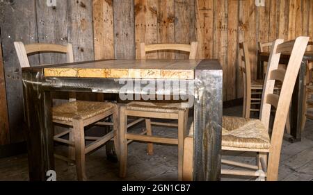 an industrial-style iron and wood table seen from above Stock Photo
