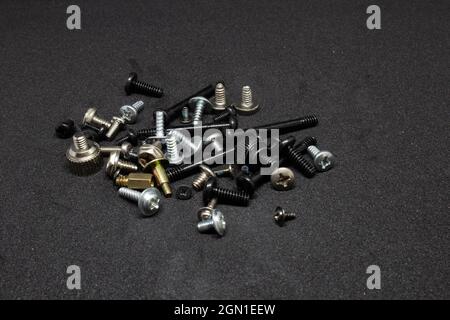mixed screws. symbolizing mixed ethnics and people but in a one community. being together. Stock Photo