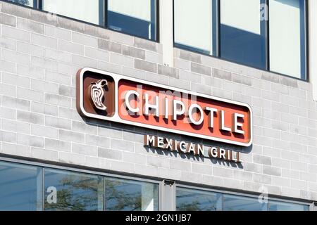 Toronto, Canada - September 7, 2021:  Close up of Chipotle Mexican Grill sign on the building in Toronto, Canada. Stock Photo