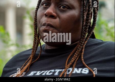 Washington DC, US, 21/09/2021, Vivian Smith, of Miami, Florida, waits to speak at a press conference about the Keeping Renters Safe Act of 2021, at the US Capitol in Washington, DC, Tuesday, September 21, 2021. Vivian is a single mother of two children who was evicted last year during the pandemic after her landlord filed an eviction case against her after getting behind on her rent, and she has been forced to make choices between buying food, health care and rent to survive. Act Credit: Rod Lamkey/CNP Stock Photo