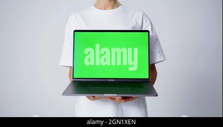 A laptop with a green screen Stock Photo
