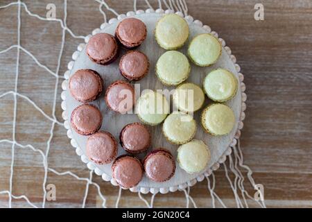 Top-view of delicious macaroons on a wooden table Stock Photo