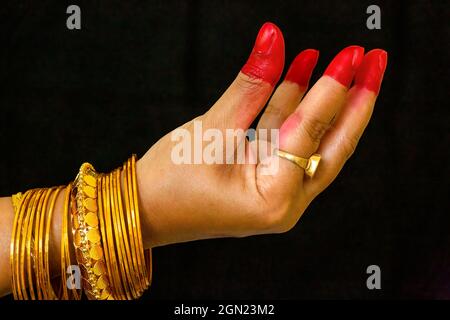 Woman dancer hand showing Kangula hasta depicting bell or fruits in Indian classical dance Bharata Natyam Stock Photo