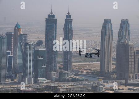 A U.S. Air Force CV-22 Osprey assigned to the 8th Expeditionary Special Operations Squadron, takes part in a photo chase mission around Dubai, United Arab Emirates, Sept 16, 2021. The mission of the CV-22 is to conduct long-range infiltration, exfiltration and resupply missions for special operations forces. The CV-22 Osprey is a tiltrotor aircraft that combines the vertical takeoff, hover, and vertical landing qualities of a helicopter with the long-range, fuel efficiency, and speed characteristics of a turboprop aircraft. (U.S. Air Force photo by Master Sgt. Wolfram M. Stumpf) Stock Photo