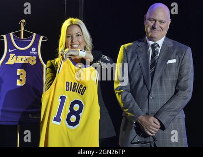 Los Angeles Lakers CEO Jeanie Buss holds a new Lakers jersey next to Tim Harris, Lakers President of Business Operations during the team's kick-off event to announce a new global marketing partnership with Bibigo, a popular South Korean food company at the UCLA Health Training Center in El Segundo, California on Monday, September 20, 2021. The Lakers' $100 million partnership with Bibigo is now the largest jersey patch deal in the NBA. It's also the league's first jersey patch deal with a company outside of the United States and LA's first international partnership in franchise history. Photo Stock Photo