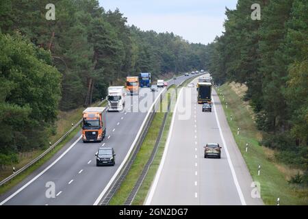 21 September 2021, Brandenburg, Wandlitz/Ot Prenden: Trucks and cars travel near the Lanke exit on the A10 motorway in both directions. Photo: Soeren Stache/dpa-Zentralbild/dpa Stock Photo