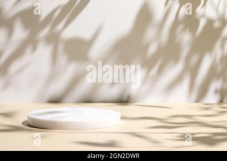 scene with circle podium on beige background and shadows Stock Photo