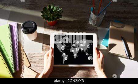Bitcoin world map and blockchain technology concept on screen Stock Photo