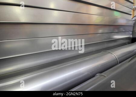 Round and angular galvanized pipes Stock Photo