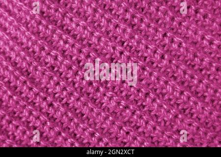 Closeup the Texture of Orchid Flower Purple Alpaca Knitted Wool Fabric in Diagonal Patterns Stock Photo