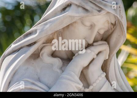 Madonna sculpture, Cuba, monuments, marble, mary, church, stone, sacred, architecture,angels, religious, ancient, memorial, emblem, pray, cemetery Stock Photo