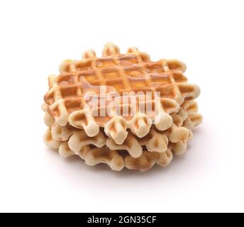 Stack of freshly baked homemade belgian waffles with honey isolated on white Stock Photo