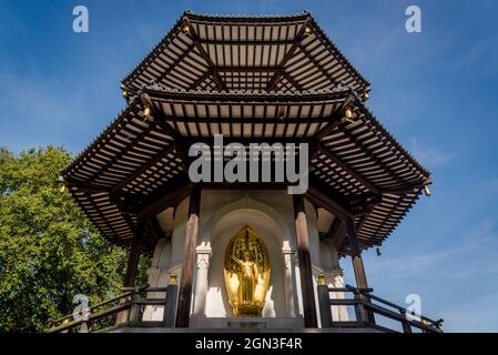 Peace Pagoda, presented to Londoners by the Buddhist leader Nichidatsu Fuji in 1984, The side represents Buddha's birth, Battersea Park, London, Engla Stock Photo