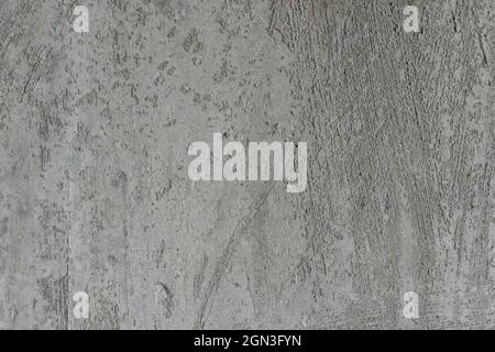 Grungy reinforced concrete wall. Grungy reinforced concrete wall surface, high resolution background texture. Stock Photo
