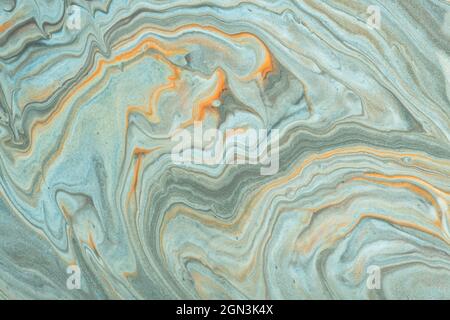 Abstract fluid art background light blue and beige colors. Liquid marble. Acrylic painting on canvas with gray gradient. Watercolor backdrop with wavy Stock Photo