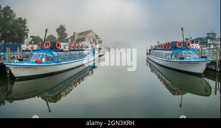 Windermere lake cruisers on a misty September morning Stock Photo