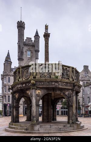 The Mercat Cross on Castle Street with the Salvation Army Citadel behind, Aberdeen, Scotland Stock Photo