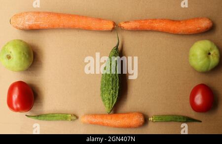 Frame created with colorful raw vegetables Stock Photo