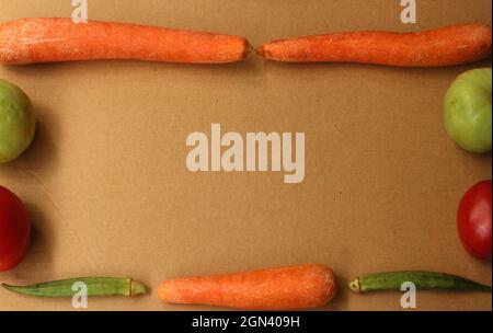 Frame created with colorful raw vegetables Stock Photo