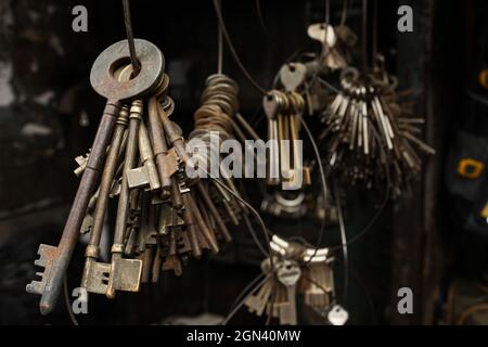 Old rusted keys in the store for show. Stock Photo
